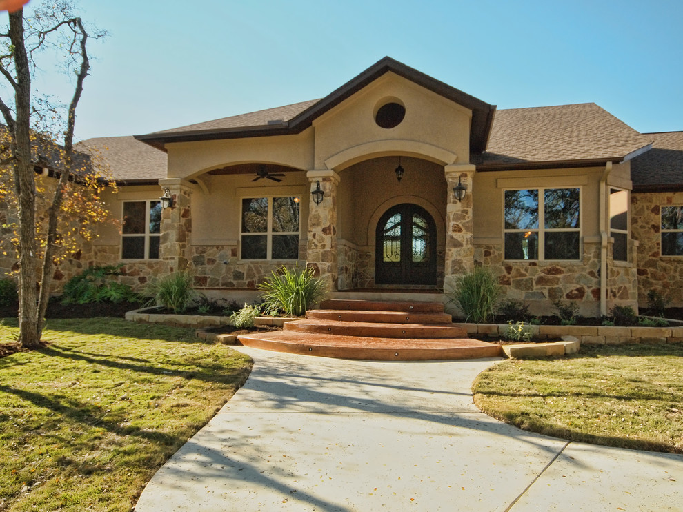 Transitional exterior home idea in Austin