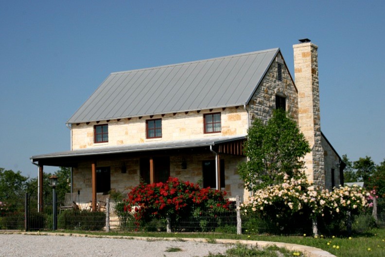 Inspiration for a cottage exterior home remodel in Dallas