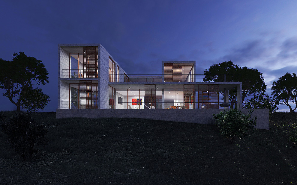 Idées déco pour une petite façade de maison grise contemporaine en béton à un étage avec un toit plat et un toit végétal.