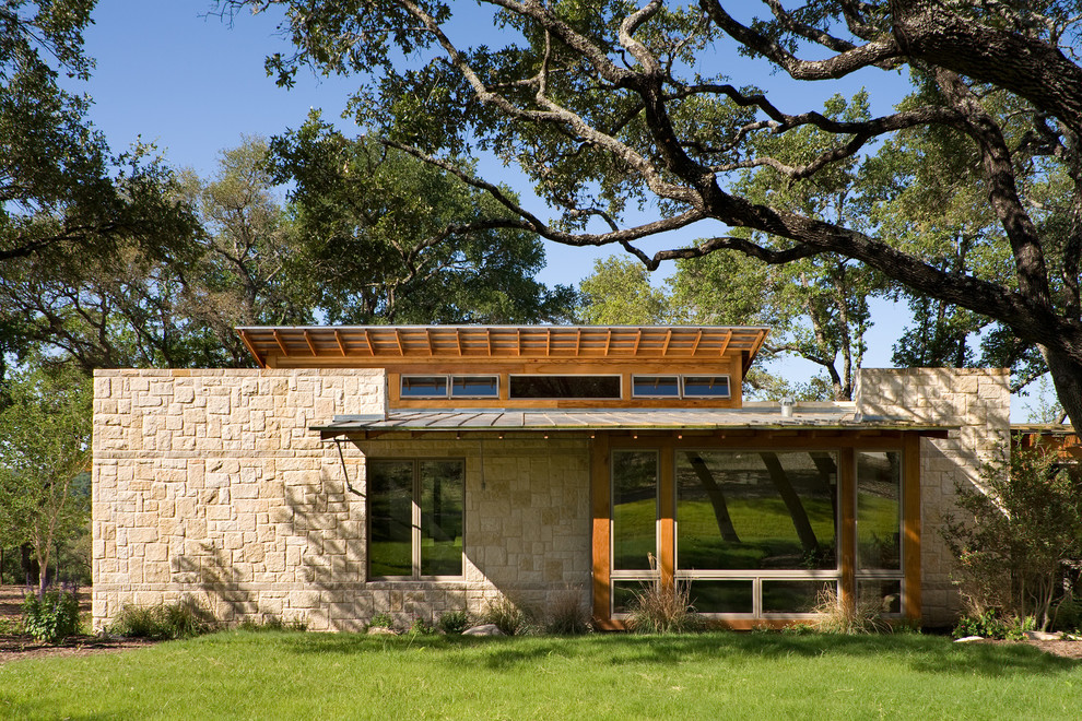 Rustic exterior home idea in Austin