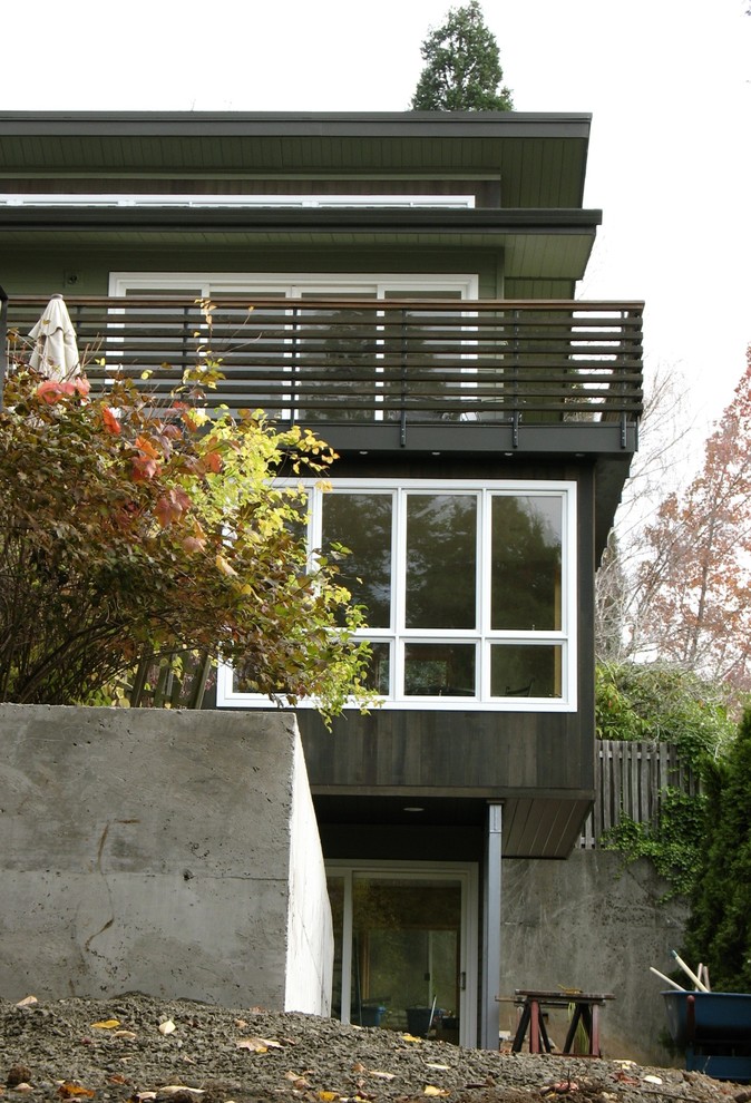 Inspiration för moderna gröna hus, med tre eller fler plan och blandad fasad