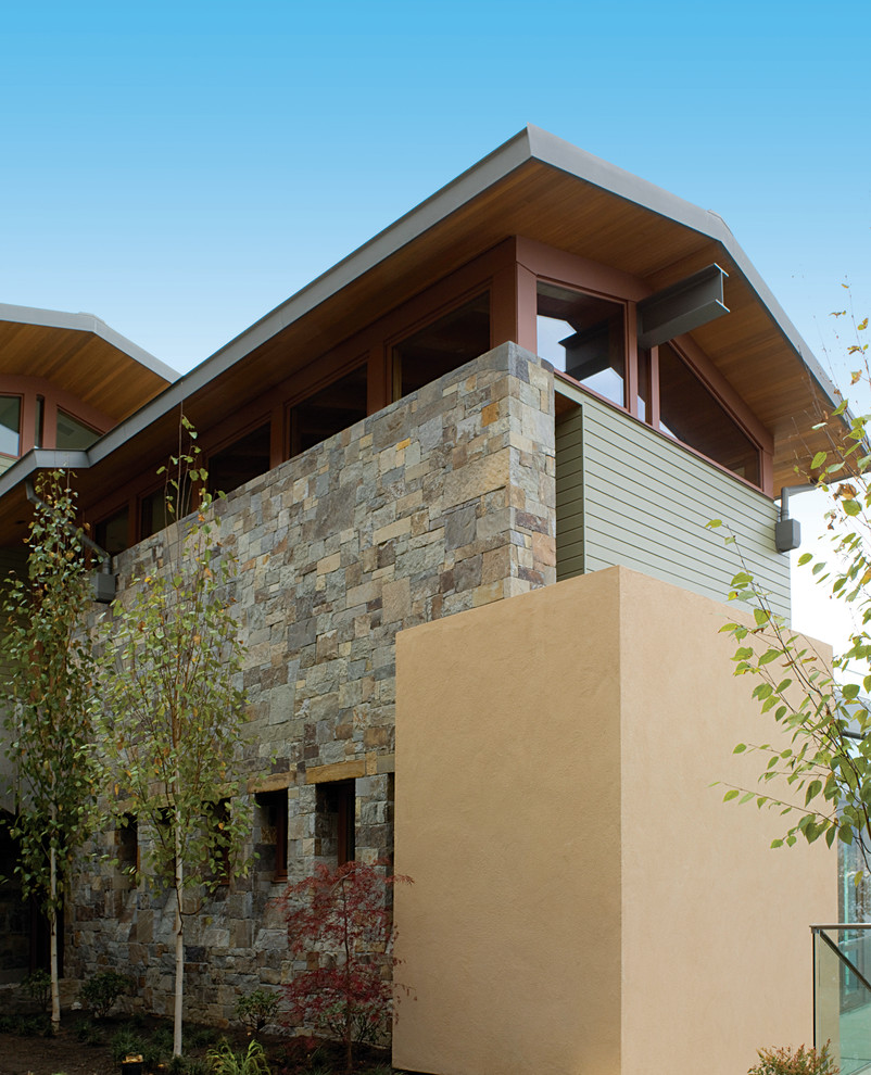 Photo of a rustic house exterior in San Francisco with wood cladding.