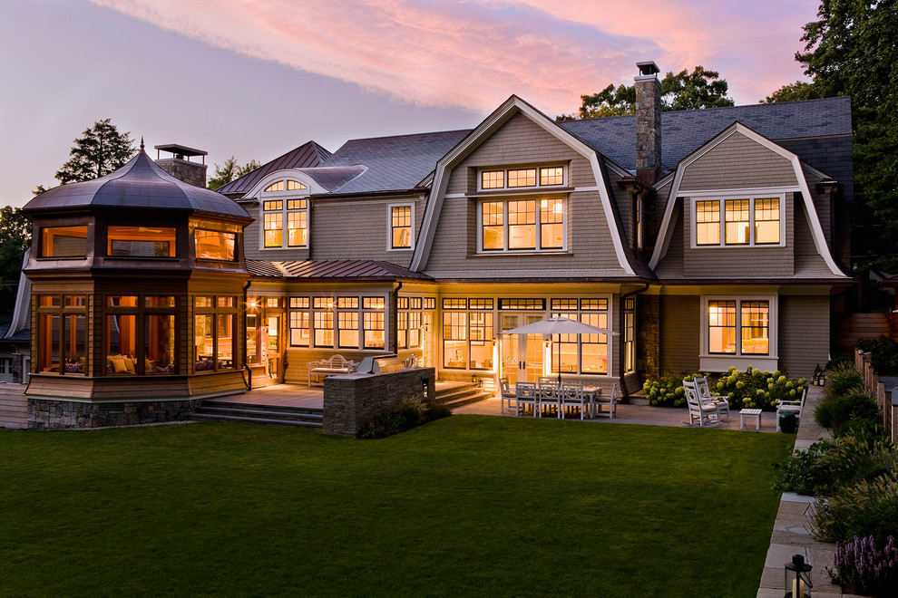 Inspiration for a victorian beige two-story exterior home remodel in Boston