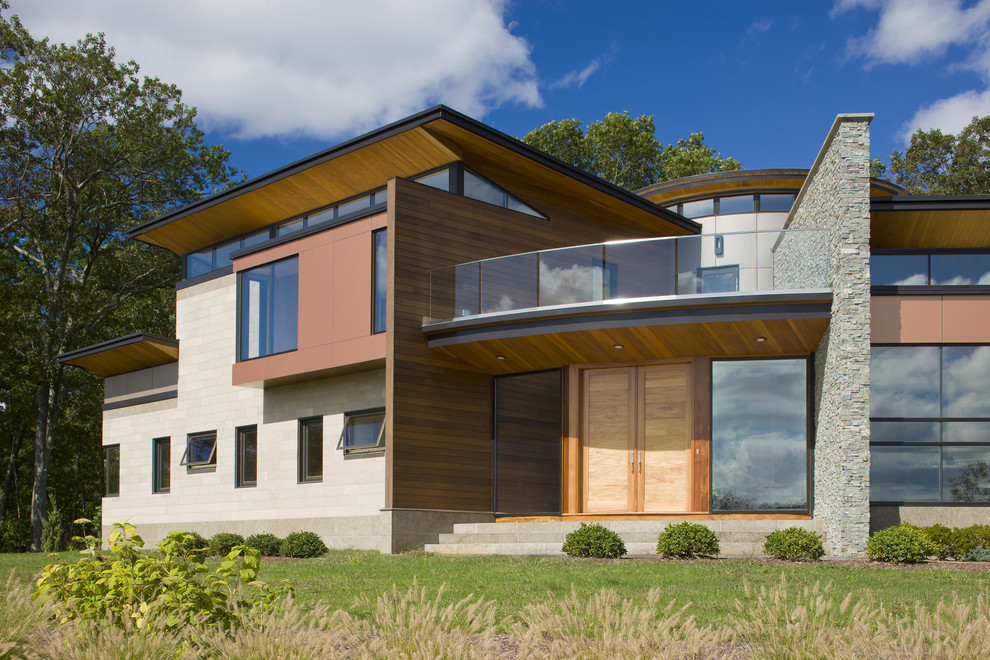 Свежая идея для дизайна: двухэтажный дом в современном стиле - отличное фото интерьера