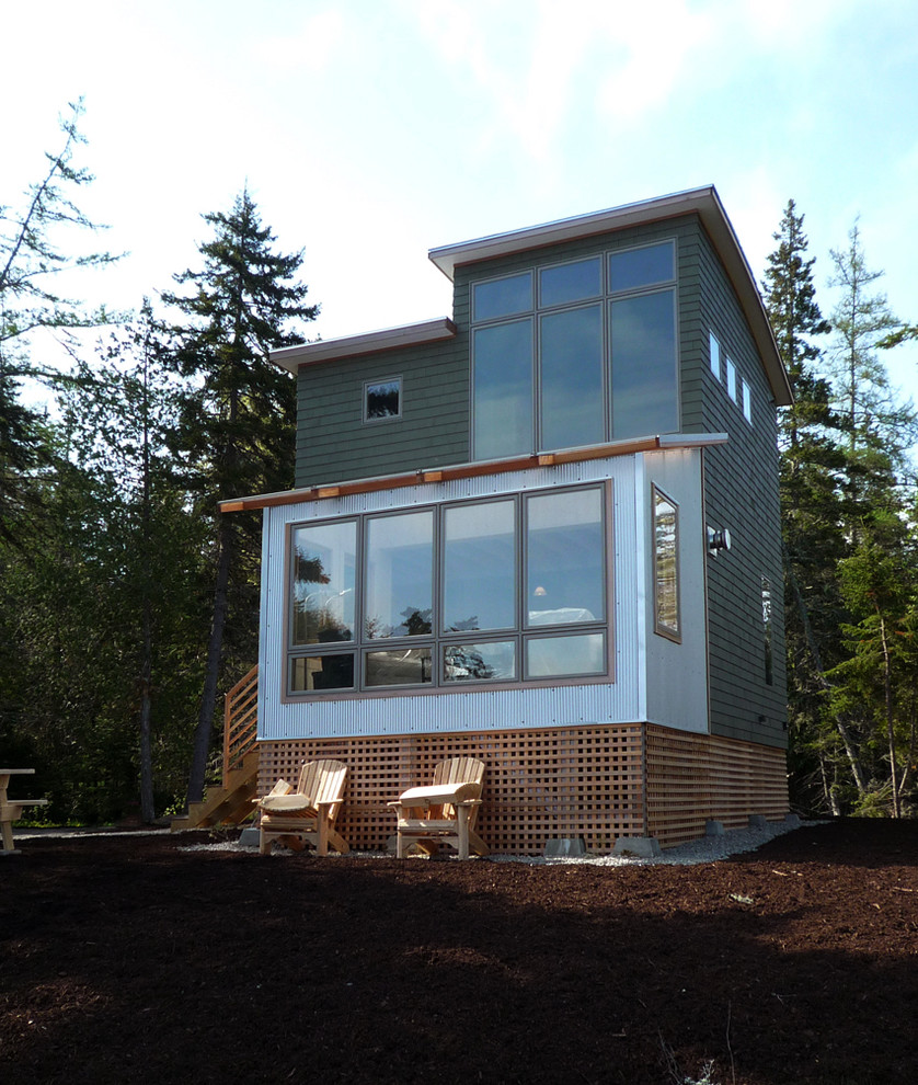 Photo of a gey contemporary two floor house exterior in Portland Maine.