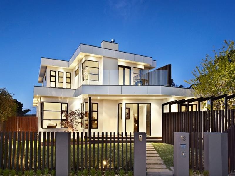 This is an example of a large and white contemporary two floor render house exterior in Melbourne.