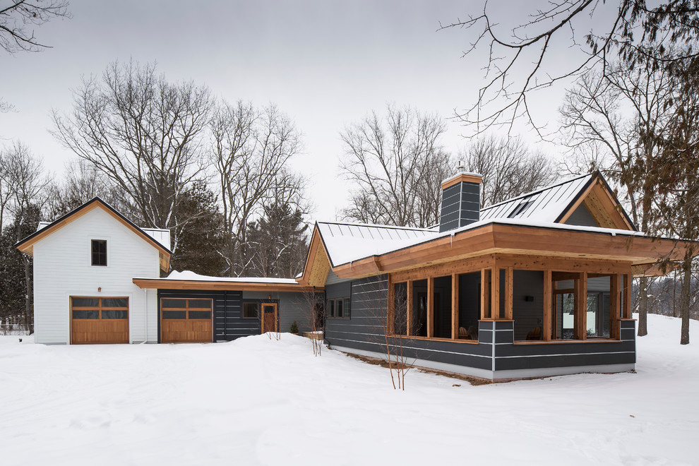 Example of a minimalist two-story exterior home design in Minneapolis