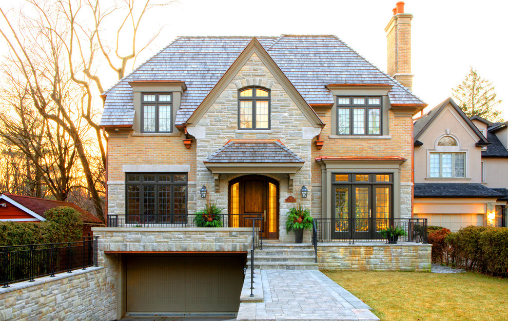 Classic two floor house exterior in Toronto with a hip roof.