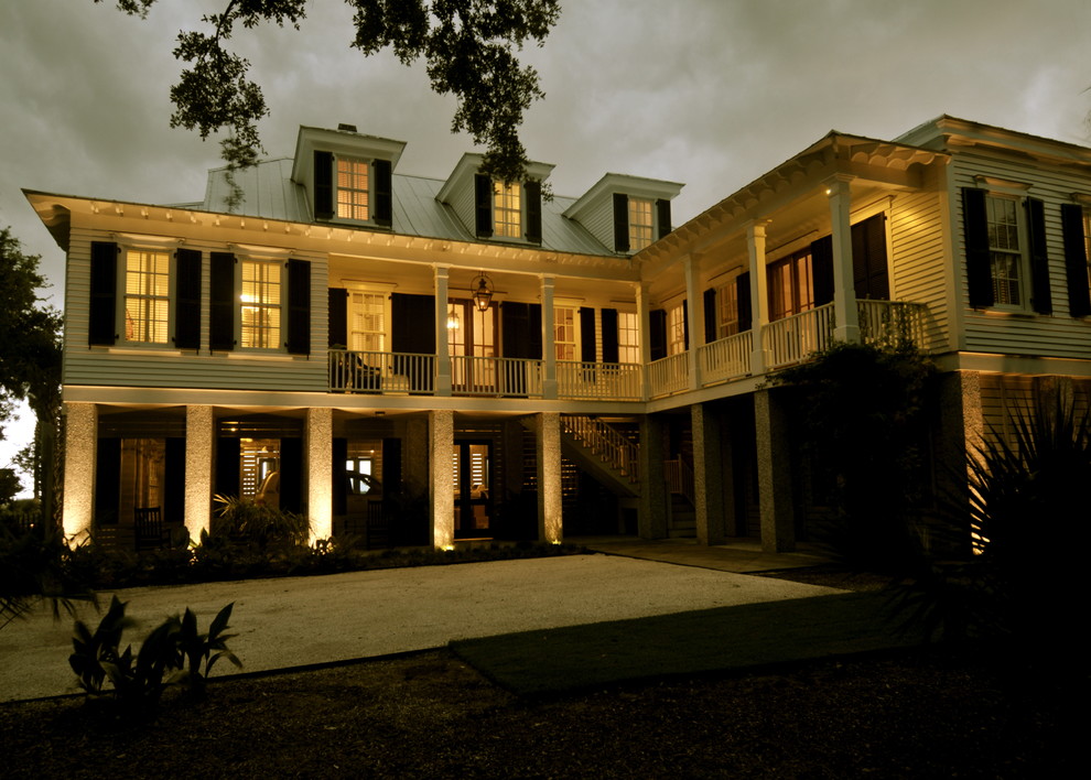 Elegant wood exterior home photo in Charleston