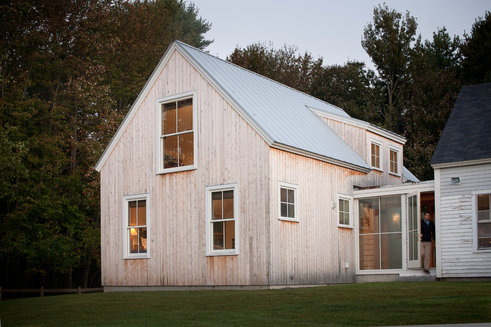 Photo of a rural house exterior in Portland Maine with wood cladding.