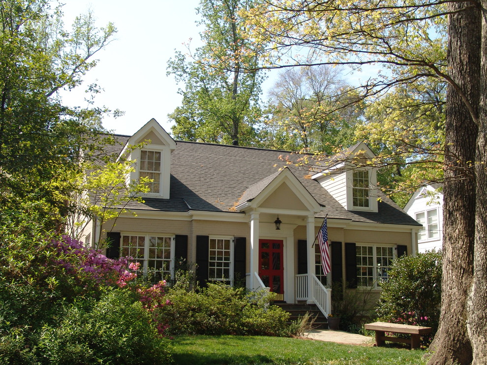 Example of a small classic two-story brick exterior home design in Atlanta