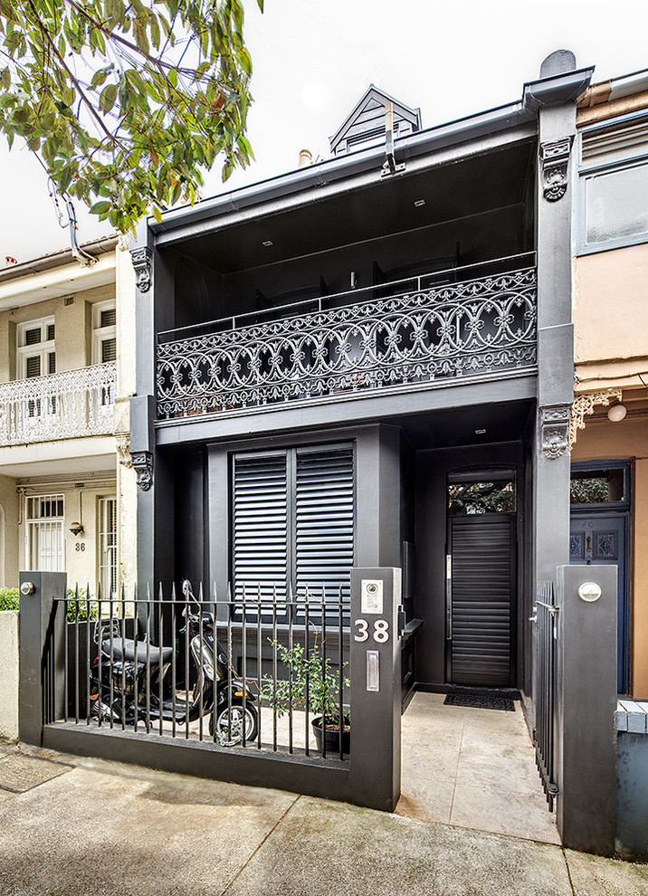 Photo of a black victorian house exterior in Sydney.