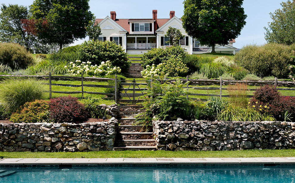 Inspiration for a country exterior home remodel in New York