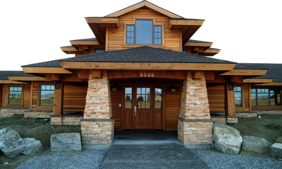 Traditional house exterior in Other with a hip roof.