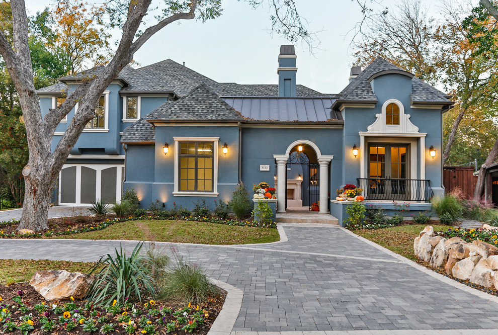 Inspiration for a blue mediterranean house exterior in Dallas.