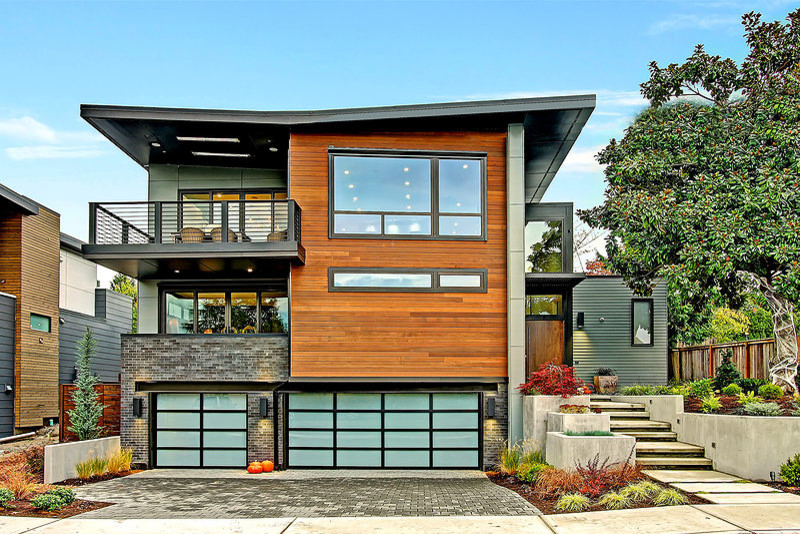 This is an example of a contemporary house exterior in Seattle with three floors.