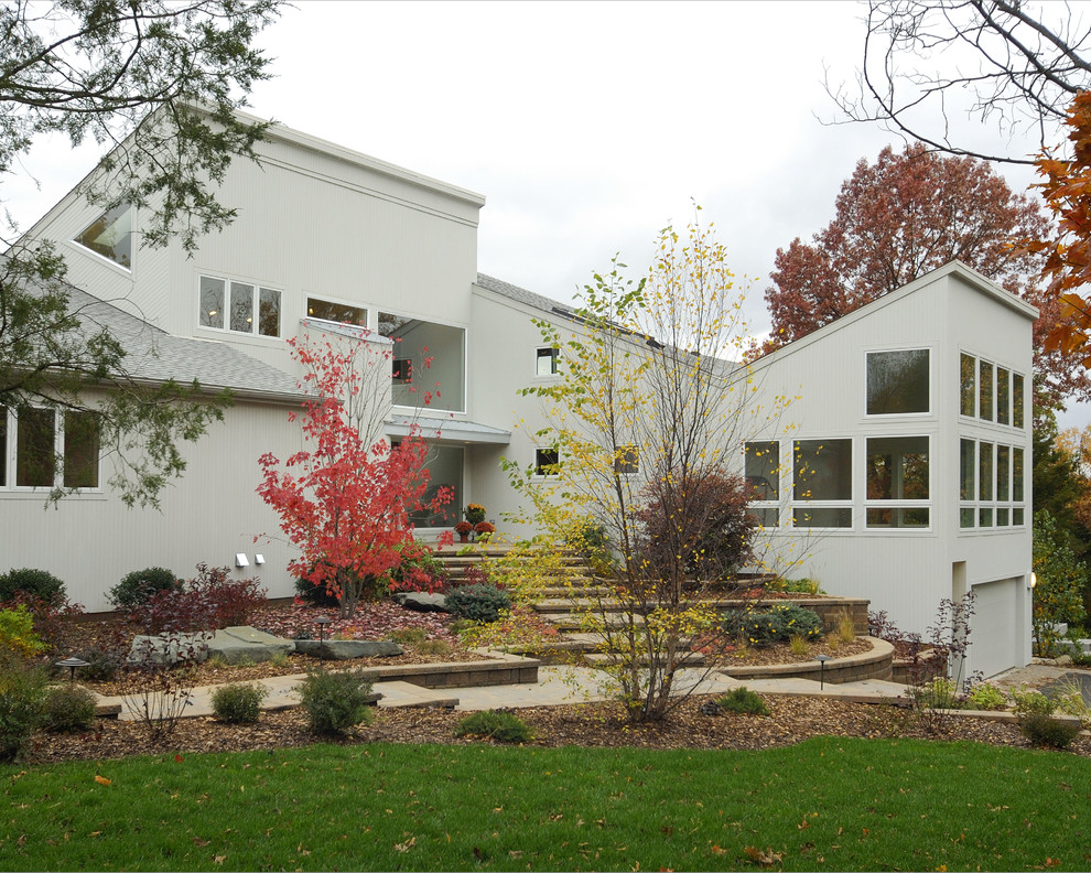 Photo of a white contemporary house exterior in Detroit.