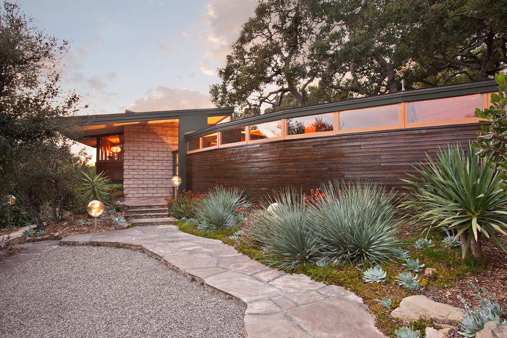 Design ideas for a modern house exterior in Santa Barbara.