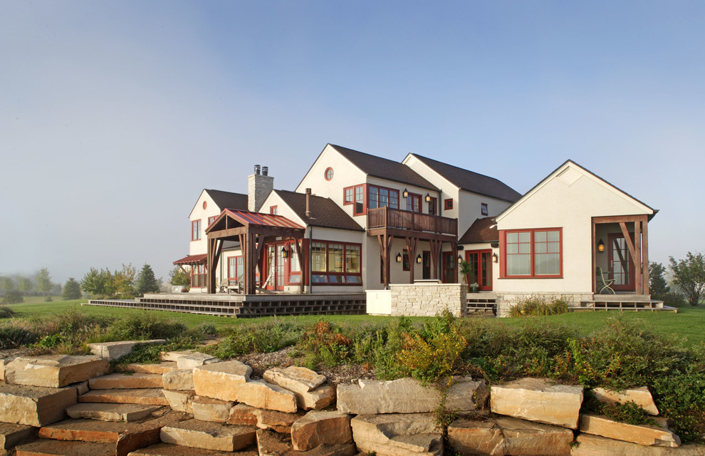 Inspiration for a timeless two-story exterior home remodel in Omaha