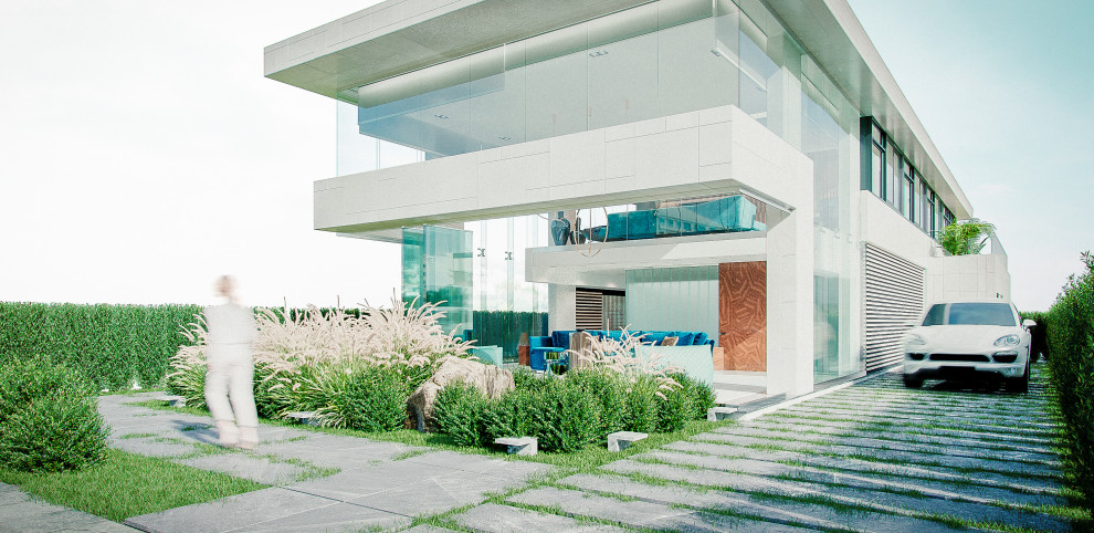 Foto della villa grande bianca contemporanea a due piani con rivestimento in cemento, tetto piano e copertura mista