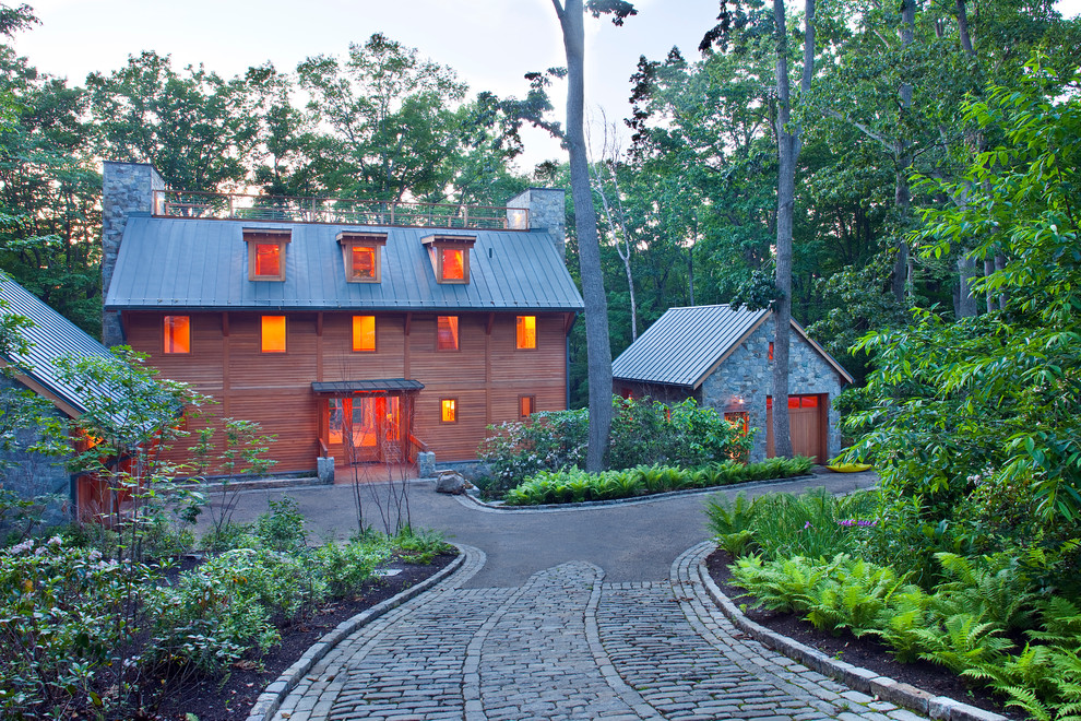 Inspiration for a rustic stone exterior home remodel in DC Metro
