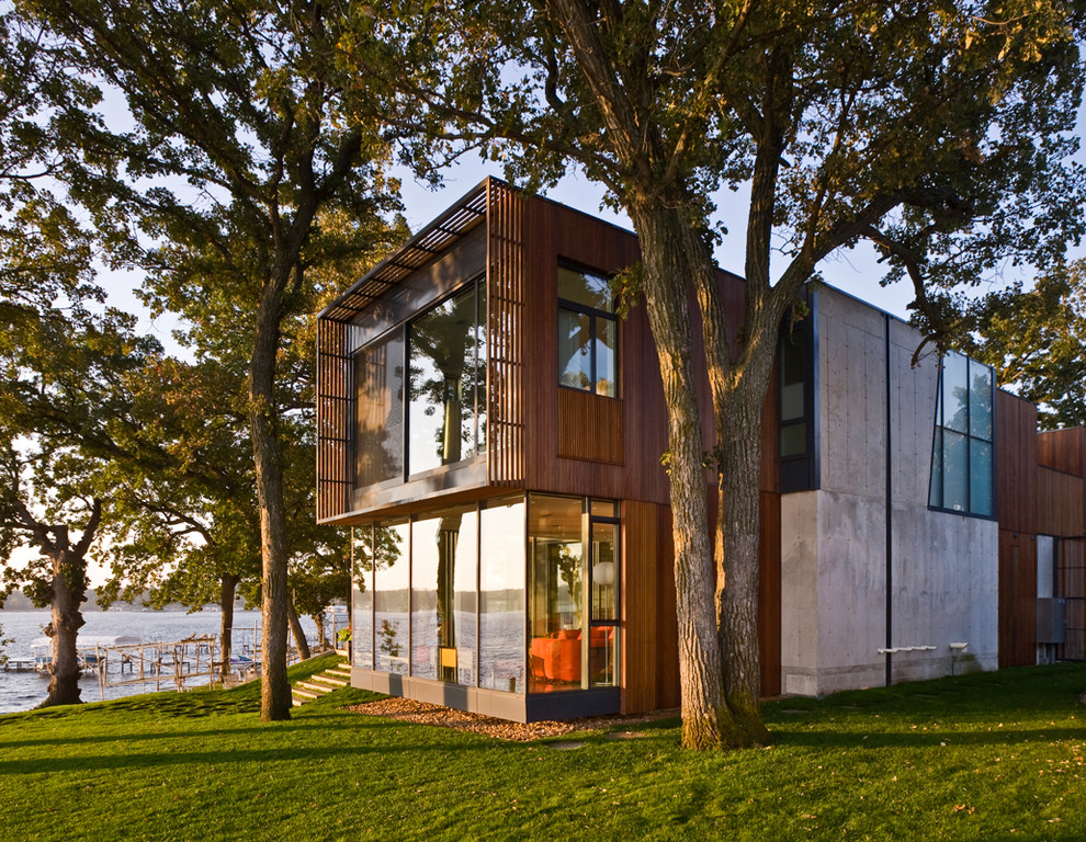 Идея дизайна: большой, двухэтажный дом в стиле модернизм