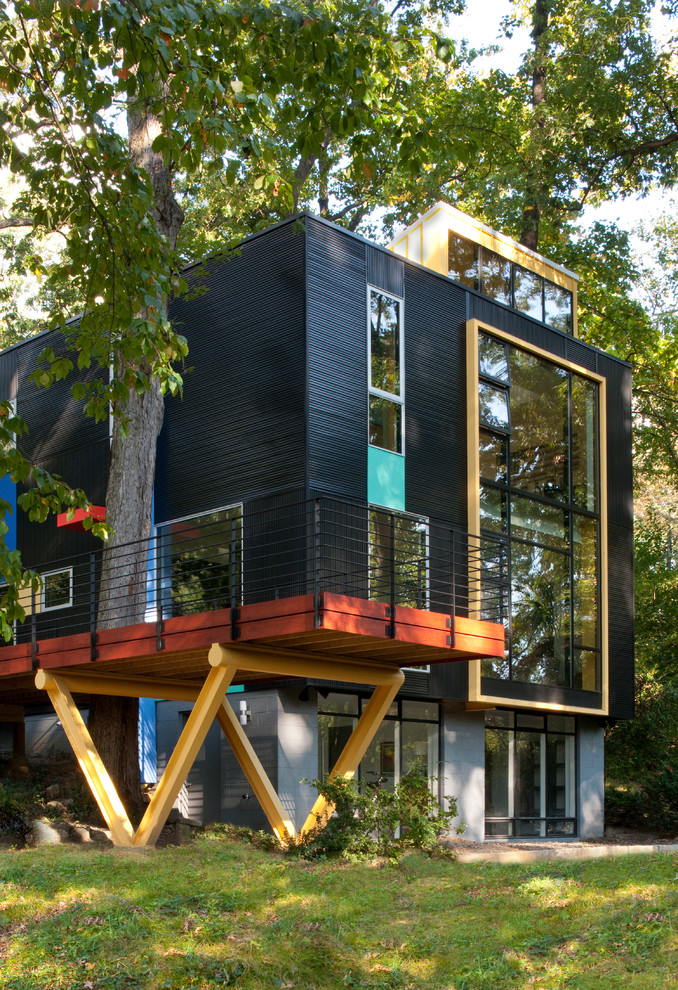 Photo of a black modern house exterior in DC Metro with three floors.