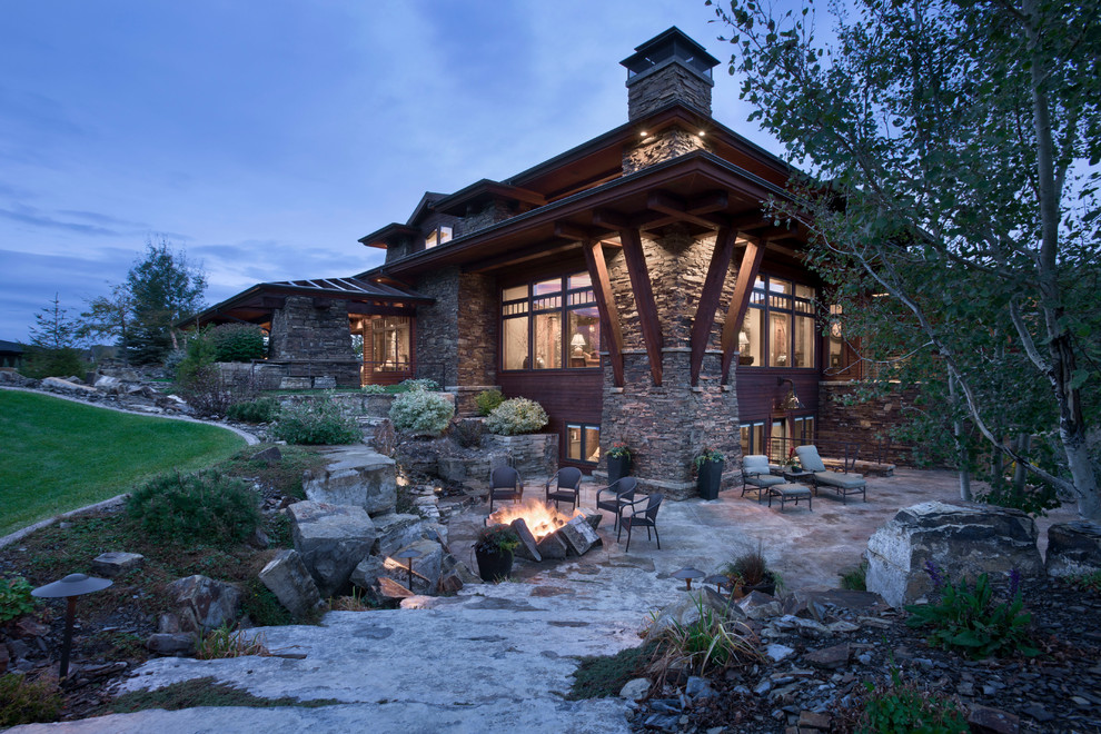 Design ideas for a rustic house exterior in Other with a hip roof.