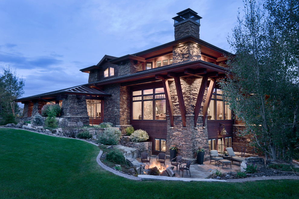 This is an example of a rustic house exterior in Other with a hip roof.