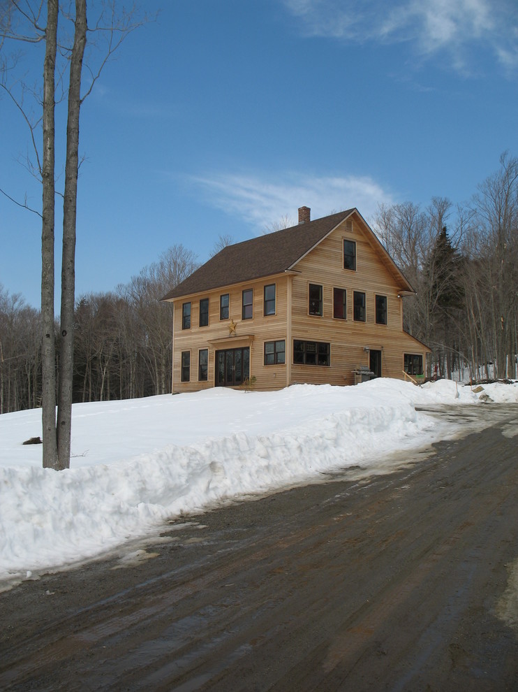 Traditional wood exterior home idea in Burlington