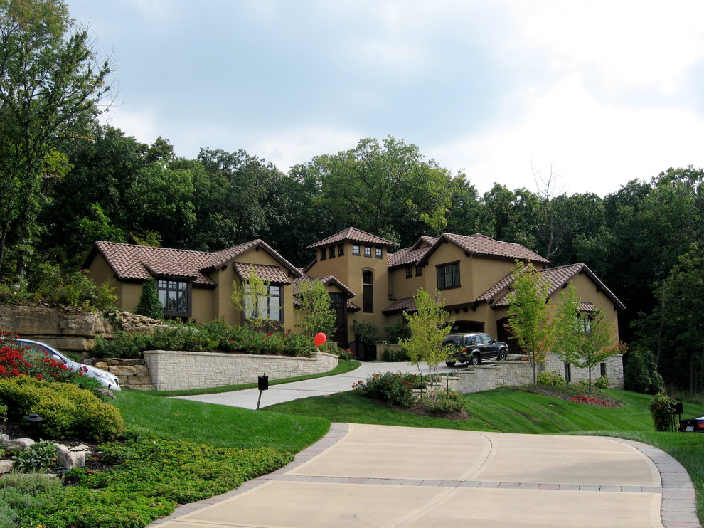 Example of a tuscan exterior home design in Kansas City