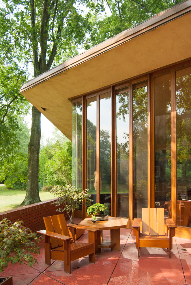 Свежая идея для дизайна: маленький дом в стиле модернизм для на участке и в саду - отличное фото интерьера