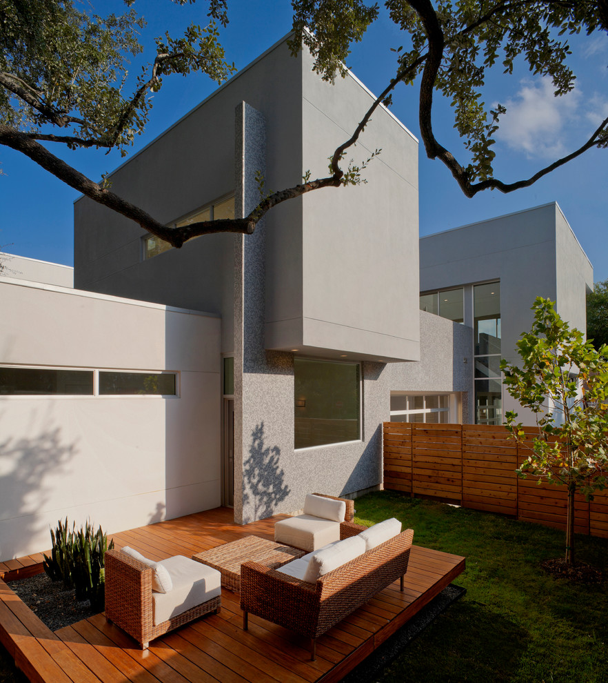 Inspiration for a contemporary gray two-story exterior home remodel in Houston