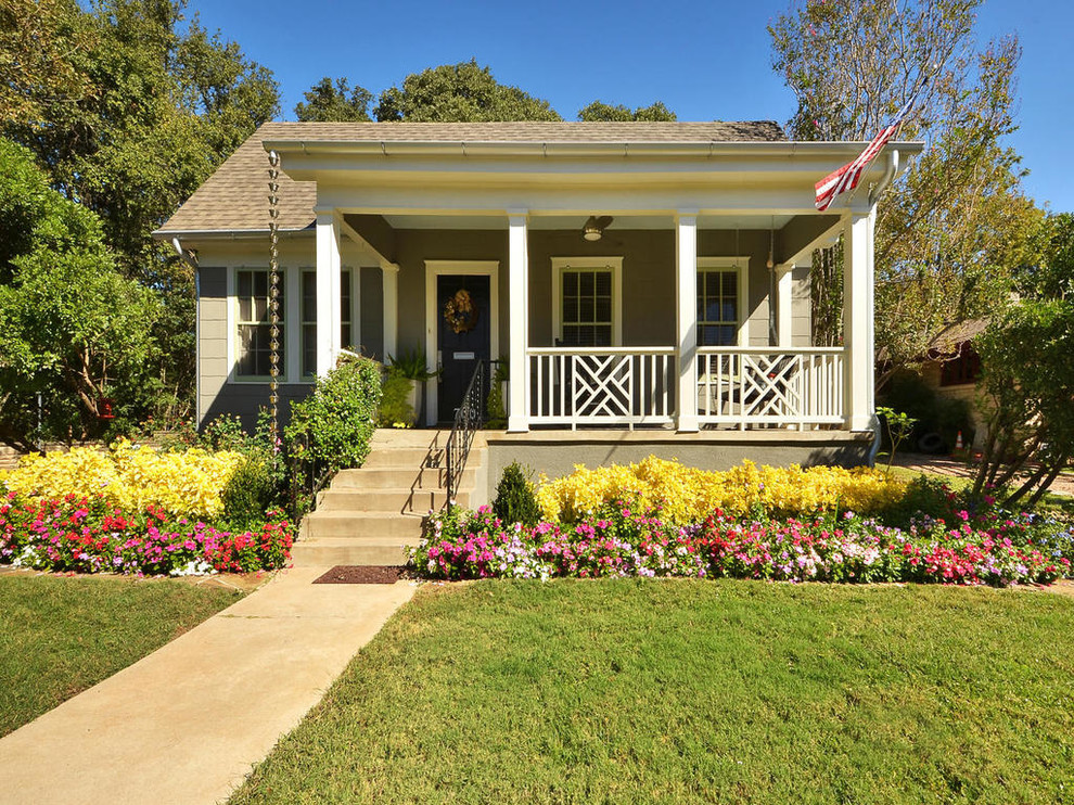 Inspiration for a timeless two-story wood exterior home remodel in Austin
