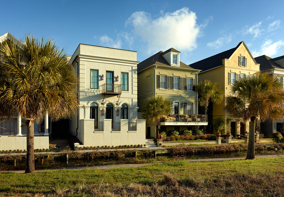 Example of a classic two-story exterior home design in Charleston