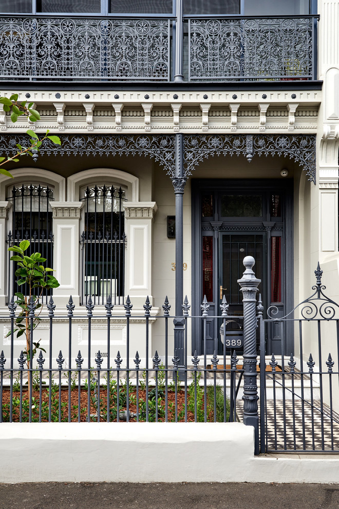 Inspiration for a large victorian two-story brick exterior home remodel in Sydney with a tile roof