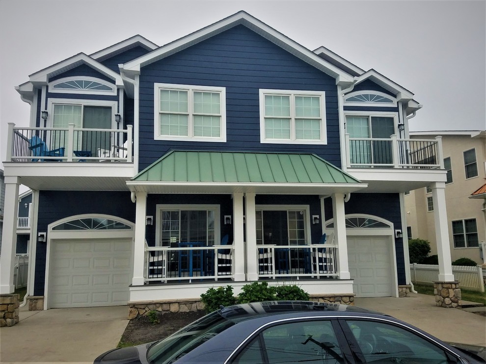 Installing Evening Blue Hardie Siding with White Trim on Beach Home