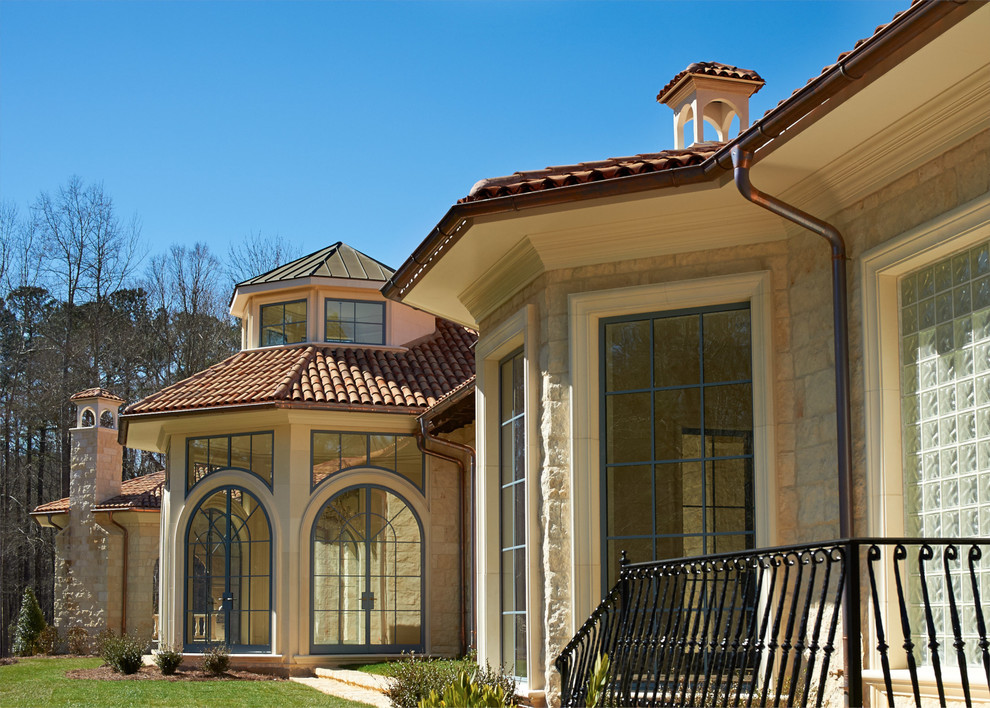 Inspiration for a large mediterranean exterior home remodel in Raleigh