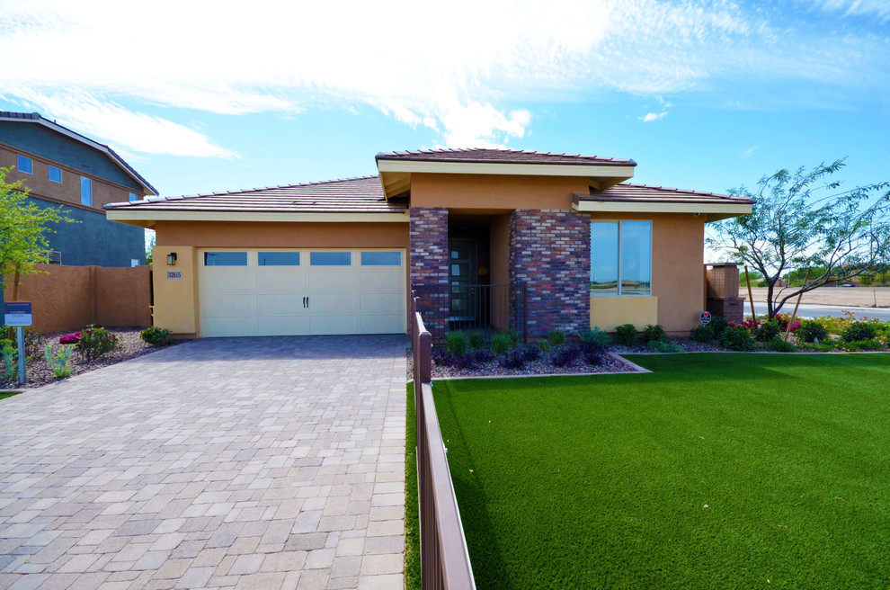 Large and beige modern bungalow render house exterior in Phoenix.