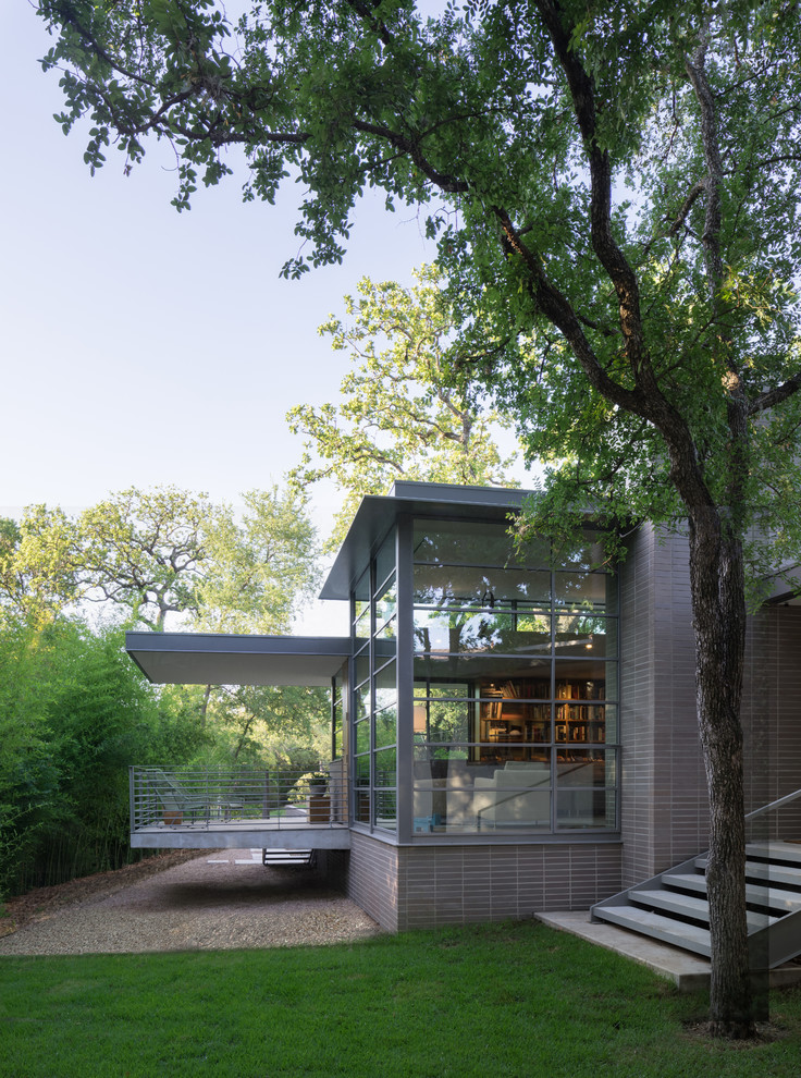 1950s one-story brick flat roof idea in Austin