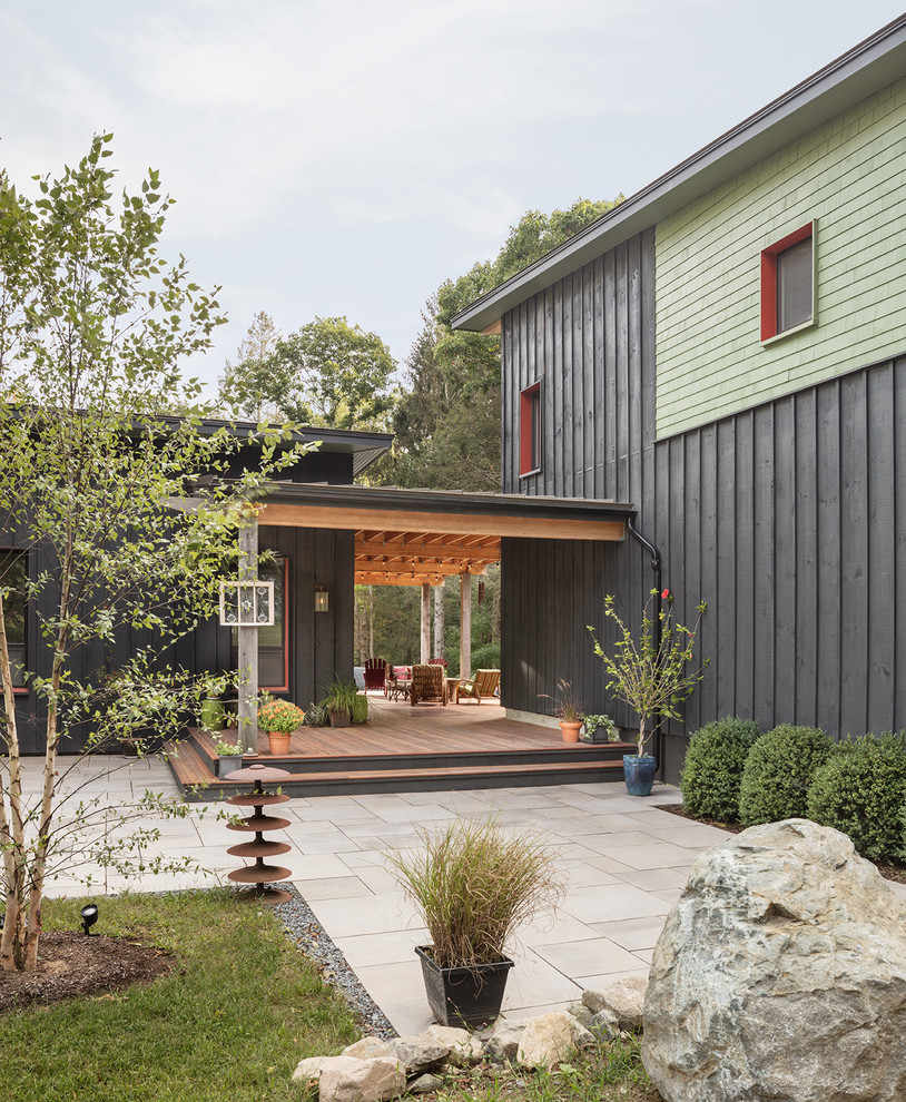 Inspiration for a green three-story house exterior remodel in Portland Maine