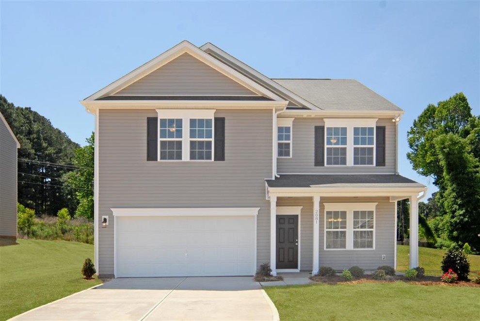 Mid-sized transitional gray two-story vinyl gable roof photo in Charlotte
