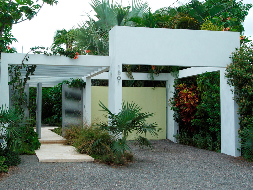 Inspiration for a white contemporary house exterior in Miami.