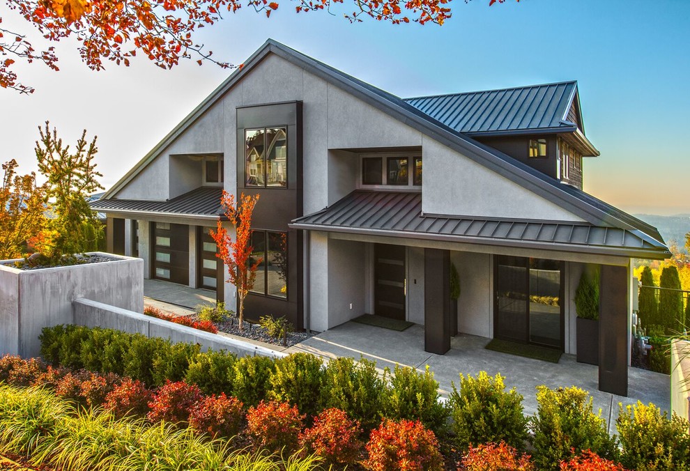 Zweistöckiges Modernes Einfamilienhaus mit grauer Fassadenfarbe und Blechdach in Seattle