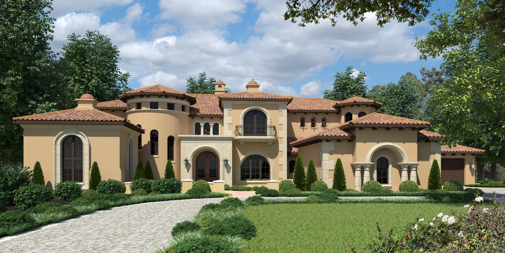 Example of a huge tuscan two-story exterior home design in Houston