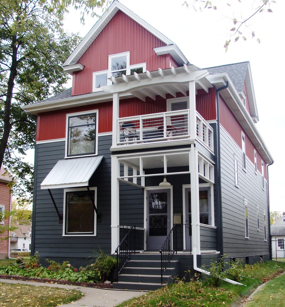 Diseño de fachada negra de estilo americano de tres plantas con revestimiento de aglomerado de cemento
