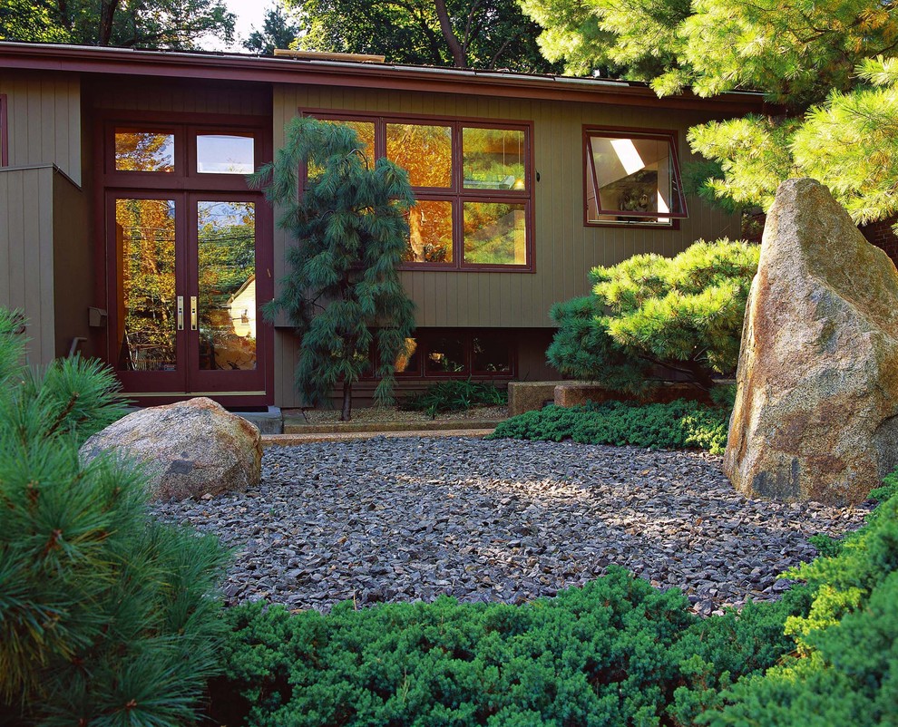 Design ideas for a world-inspired house exterior in Boston.