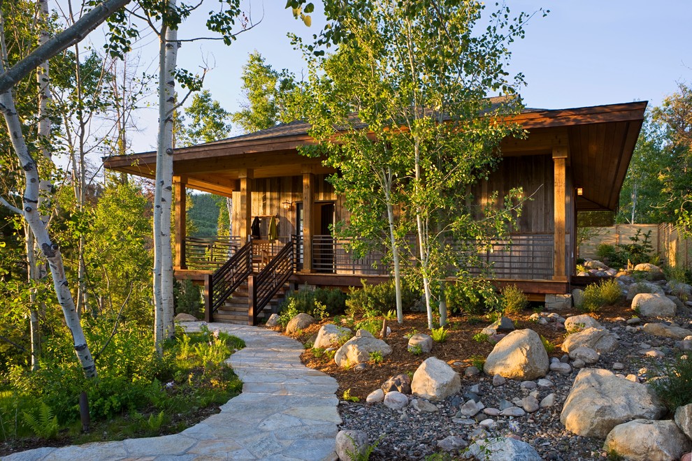 Example of a small mountain style gray one-story mixed siding exterior home design in Denver