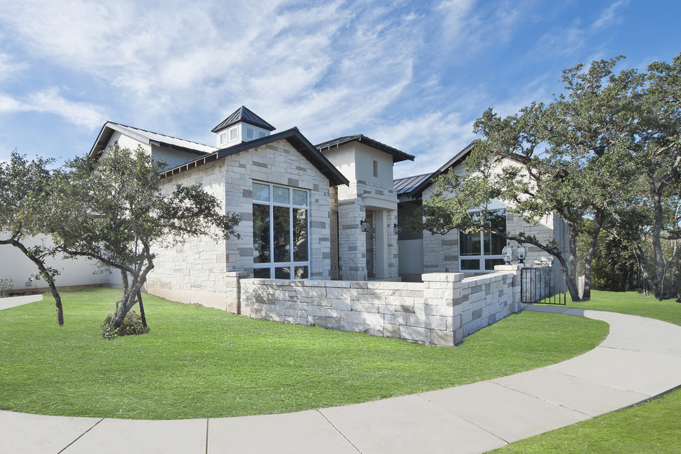Inspiration for a transitional exterior home remodel in Austin