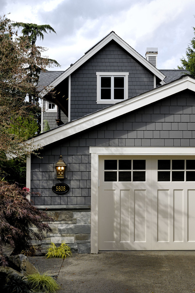 Elegant wood exterior home photo in Seattle